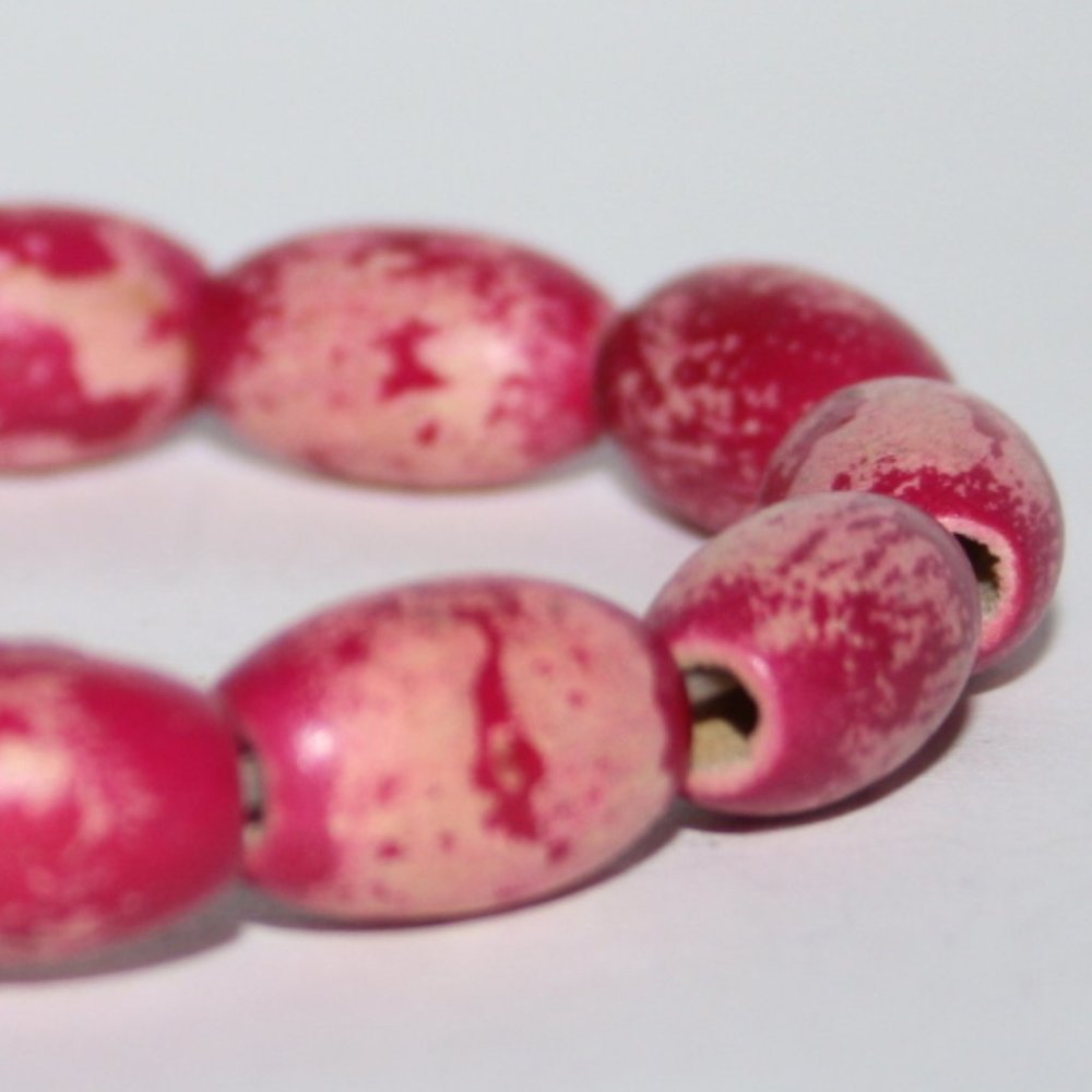 Pink dyed wooden bead bracelet 7"
